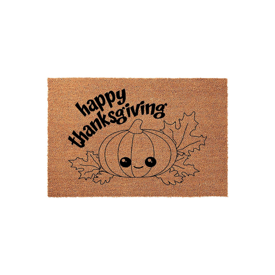 Happy Thanksgiving coir doormat featuring a cute illustrated pumpkin with a smiling face and autumn leaves, set against a natural brown fiber background to welcome guests to your home for the fall holiday season with festive
