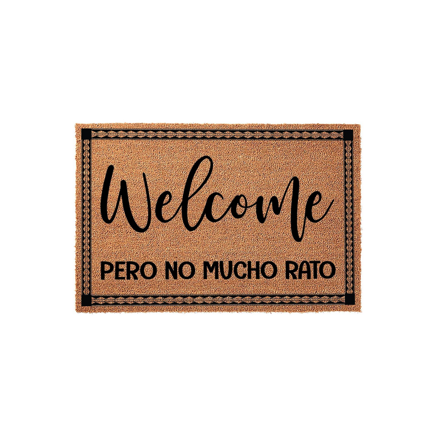 Funny Welcome Pero No Mucho Rato doormat featuring a natural coir texture with a black border and bold typography, perfect for adding a humorous touch to your front porch decor while greeting guests with a playful Spanish phrase.