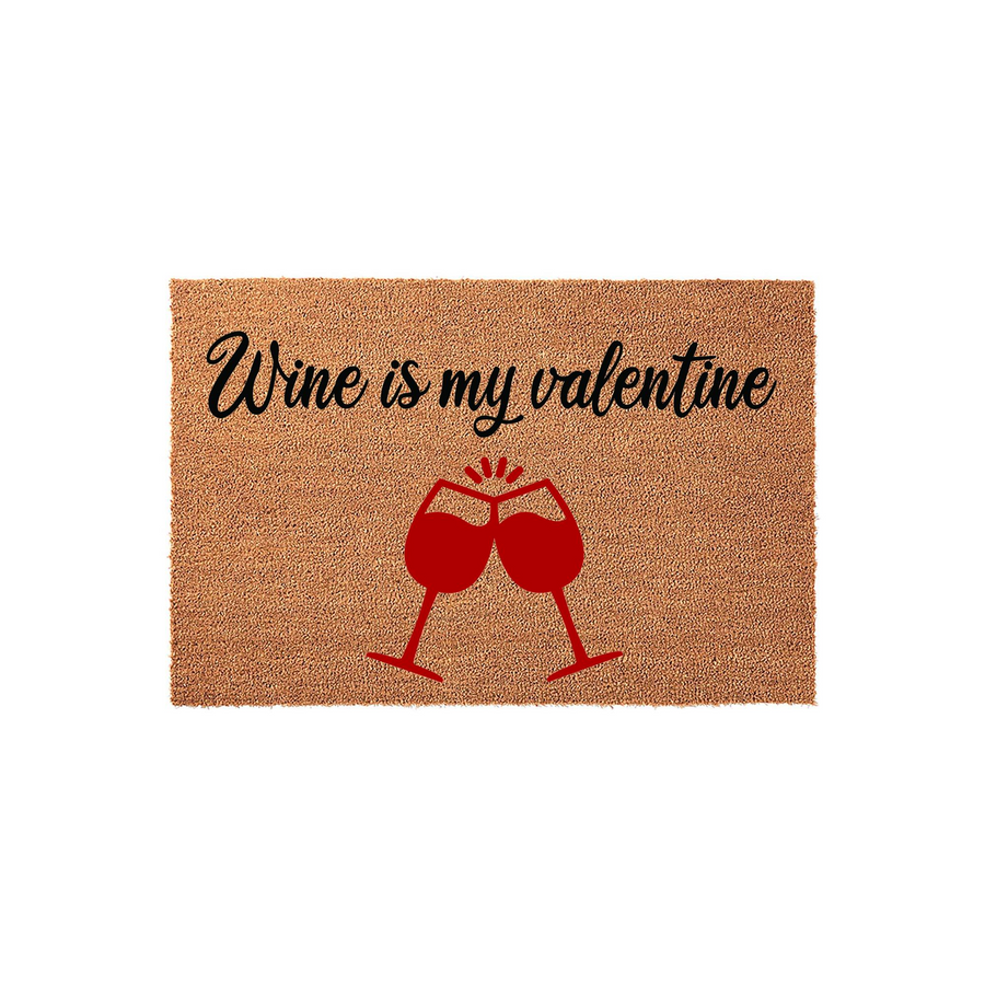 Wine is my valentine coir doormat featuring a natural brown fiber texture with black cursive text and a graphic of two red wine glasses clinking together, making a festive front porch decor piece for the holiday season.