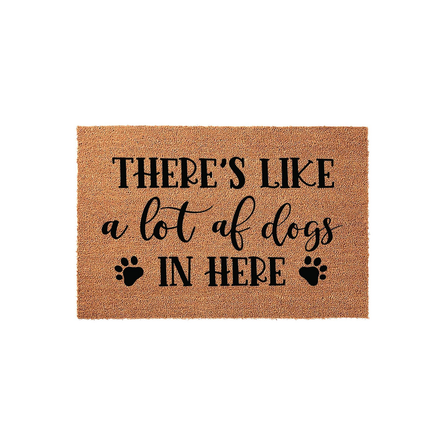 Funny Dog Lover Coir Doormat featuring the text There is like a lot of dogs in here with black paw print accents, displayed on a clean white background as a humorous welcome mat for any pet owner home entrance or front porch