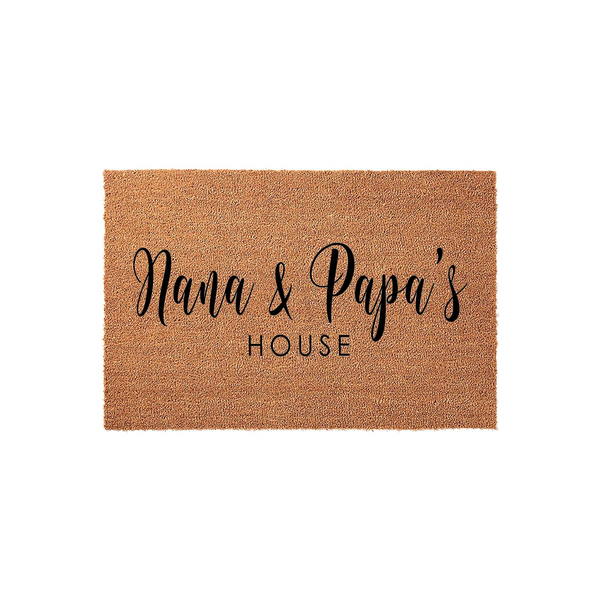 Nana and Papa's House coir doormat featuring a natural tan fiber texture with bold black lettering, displaying a stylish script and clean sans-serif font on a plain white background for a welcoming front porch entrance decor.