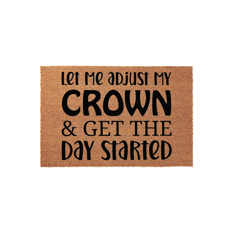 Let Me Adjust My Crown and Get The Day Started coir doormat featuring bold black typography on a natural brown fiber background, creating a fun and welcoming entrance piece for your front porch or home entryway decor.