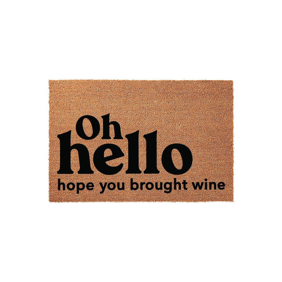 Funny Oh Hello Hope You Brought Wine doormat made of natural coir fibers, featuring bold black typography centered on a textured brown background that adds a humorous and welcoming touch to any front porch or entryway decor.