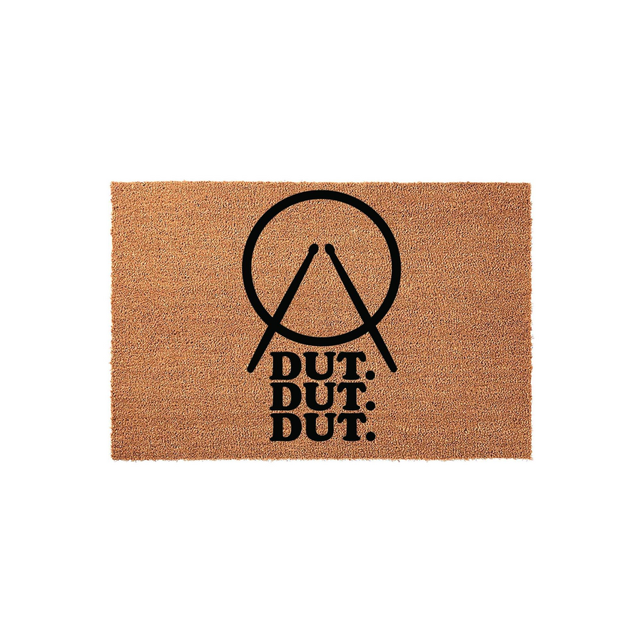 Drummer Coir Doormat featuring a black graphic of crossed drumsticks inside a circle with the text DUT DUT DUT printed below, set against a natural tan textured coir background for a fun musical entrance to any home or music