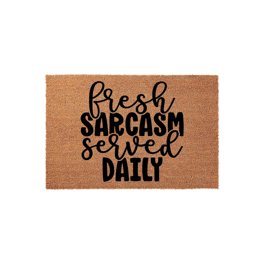 Fresh Sarcasm Served Daily coir doormat featuring bold black typography printed on a natural brown coconut fiber mat, creating a humorous and welcoming entrance piece for your front porch or home entryway decor.