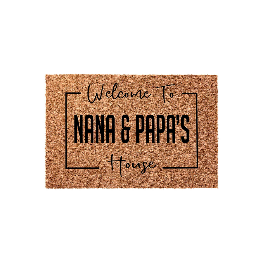 Personalized Nana and Papa's House doormat featuring a natural coir texture with black printed text inside a simple rectangular border, creating a warm and inviting entryway accent for a grandparent's home on a clean white