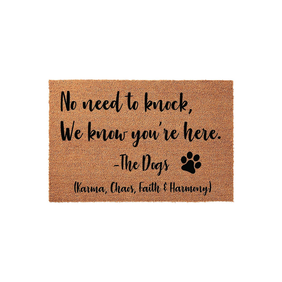Personalized dog lover doormat featuring a natural coir texture and black text that reads No need to knock, We know you are here, signed by the dogs with a paw print icon on a clean white background for a fun entryway decor