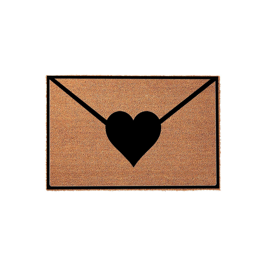 Love Letter Envelope Coir Doormat featuring a natural tan fiber texture with a bold black graphic of an envelope sealed with a heart, creating a charming and welcoming entryway accent for your home porch or front door decor.