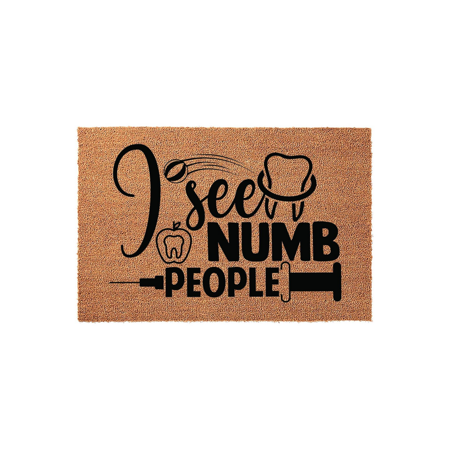 Funny Dental Hygienist Doormat featuring the text I see numb people with a tooth, apple, and syringe graphic printed in black on a natural brown coir fiber mat, creating a humorous welcome for a dentist or dental office front