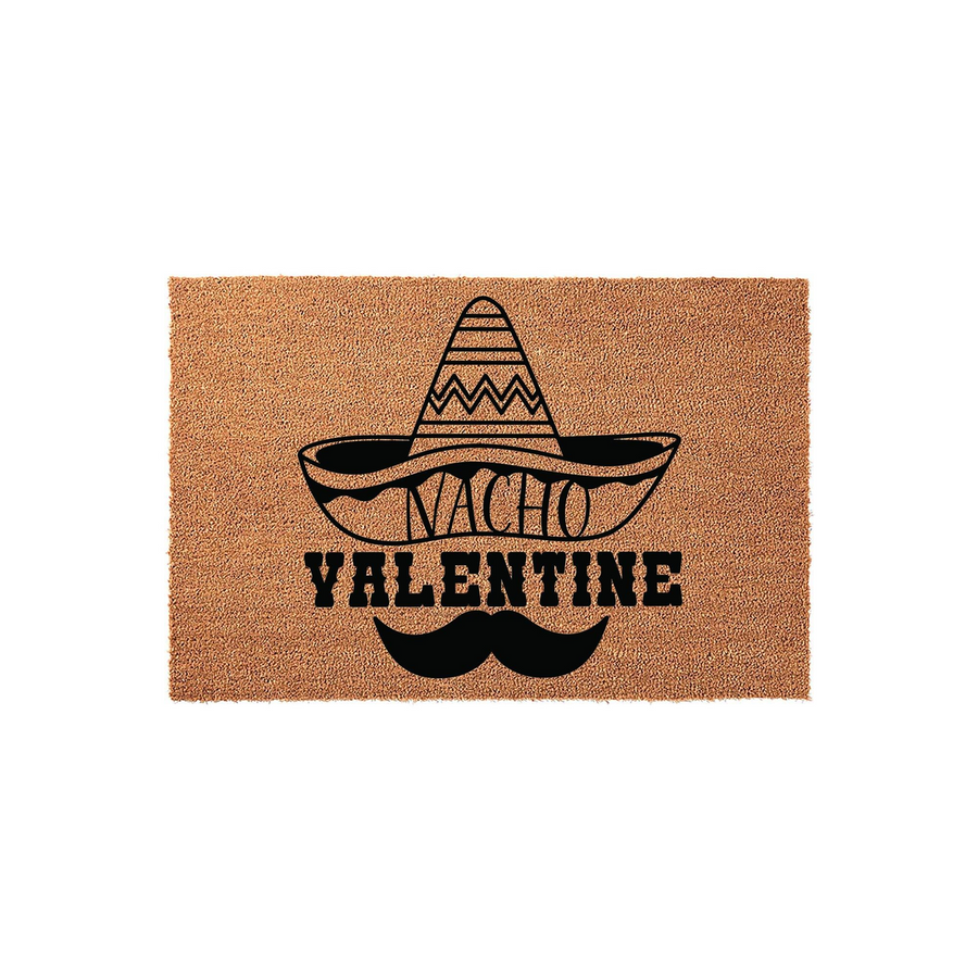 Nacho Valentine coir doormat featuring a black printed graphic of a sombrero and a mustache on a natural brown fiber background, creating a fun and festive entryway decor piece for your home during the holiday season.