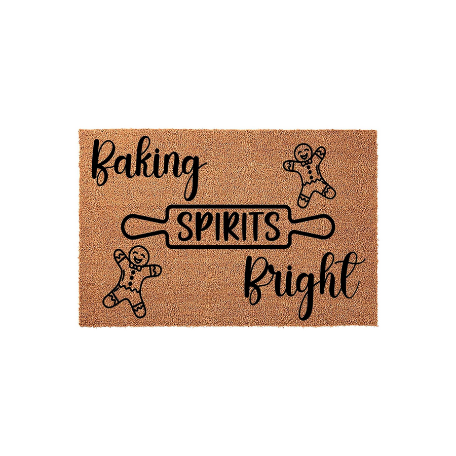 Baking Spirits Bright Christmas doormat made of natural coir fiber, featuring a festive rolling pin graphic and two cute gingerbread men illustrations printed in black ink against the textured tan background for holiday home