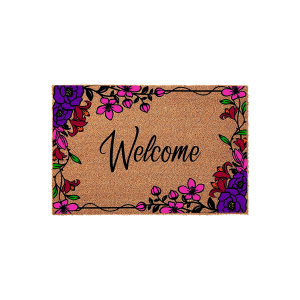 Floral Welcome Doormat featuring a natural coir texture with a vibrant border of purple and pink flowers, centered with elegant black script lettering that reads Welcome to greet guests at your front door with a colorful