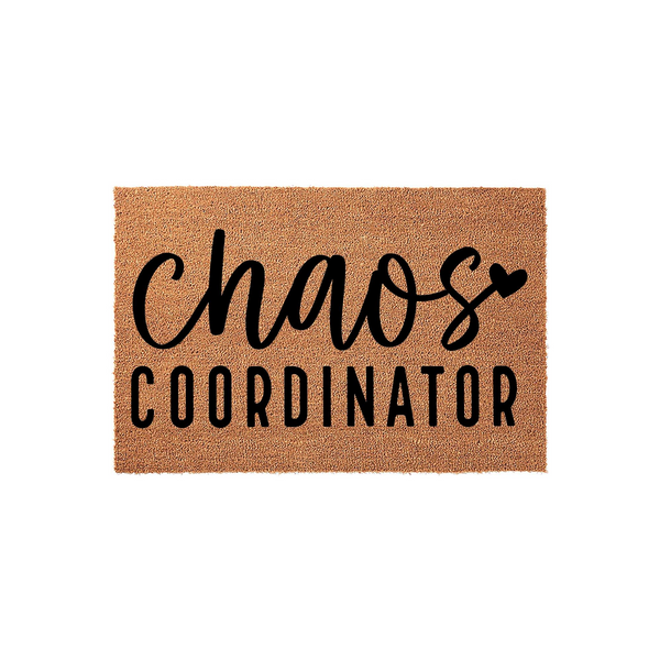 Chaos Coordinator coir doormat featuring a natural brown fiber texture with bold black lettering that reads chaos coordinator in a mix of script and sans-serif fonts, set against a clean white studio background for a modern home
