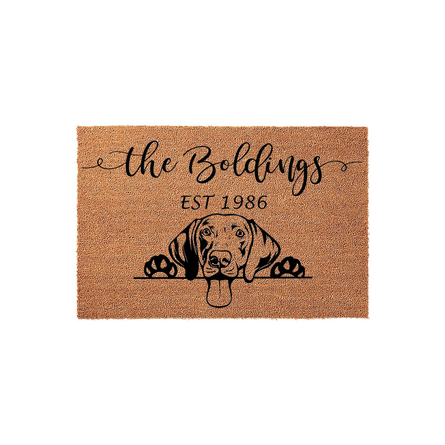 Personalized Dog Breed Coir Doormat featuring a cute Beagle illustration peeking over a line, customized with a family name and established year on a natural tan textured background for a welcoming front porch entrance decor