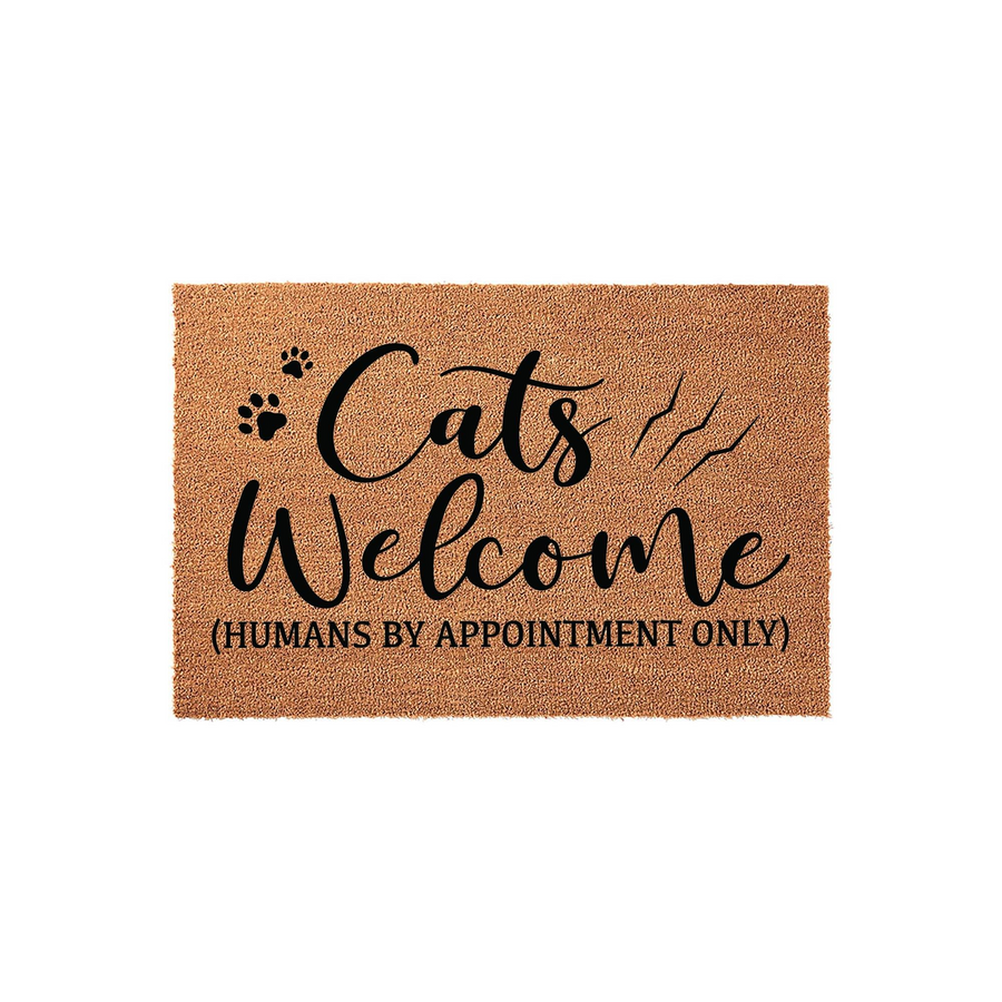 Cats Welcome doormat featuring a natural coir texture with black text that reads Cats Welcome and Humans By Appointment Only, accented by playful paw prints and claw marks for a fun entryway decor piece for any cat lover home.