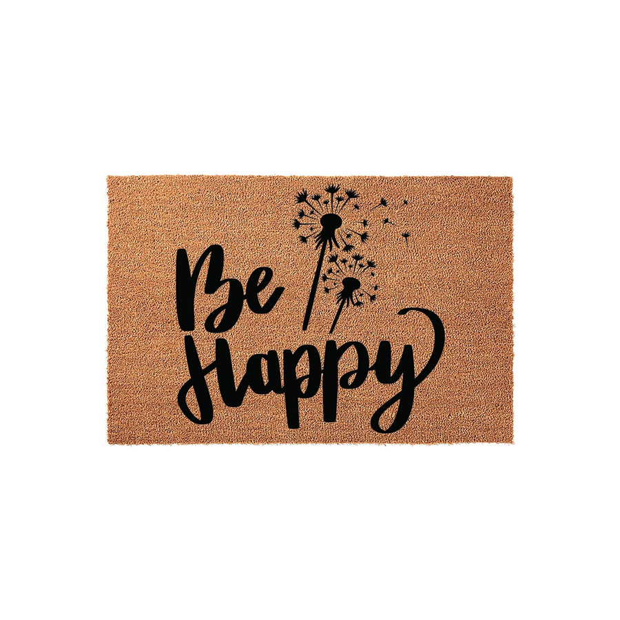 Be Happy dandelion doormat featuring a natural tan coir texture with bold black lettering and a whimsical dandelion seed head illustration, creating a cheerful and welcoming entrance decor piece for your home front porch.