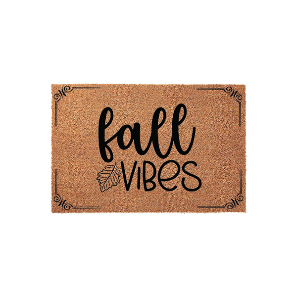 Fall Vibes coir doormat featuring a natural brown fiber texture with black printed text and a decorative leaf accent, framed by elegant corner flourishes on a clean white background for a seasonal front porch entryway decor
