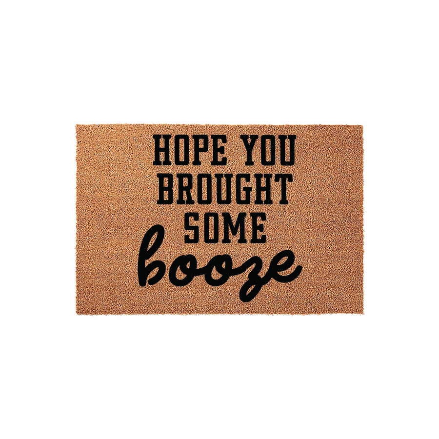 Hope You Brought Some Booze funny doormat featuring bold black text on a natural coir fiber background, designed as a humorous welcome mat for a front porch or entryway to greet guests with a playful message about bringing drinks.