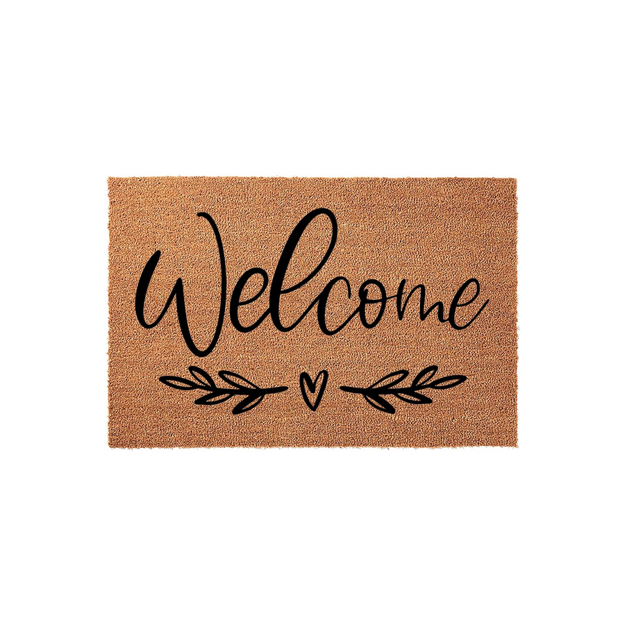 Welcome coir doormat featuring a natural tan fiber texture with black script lettering that says Welcome, accented by a simple hand-drawn heart and leafy branch design centered on a clean white studio background for a modern