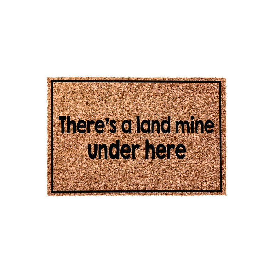 Funny Land Mine Doormat featuring a natural coir texture with a bold black border and the humorous text There is a land mine under here printed in the center, creating a playful and welcoming entrance for your home front porch