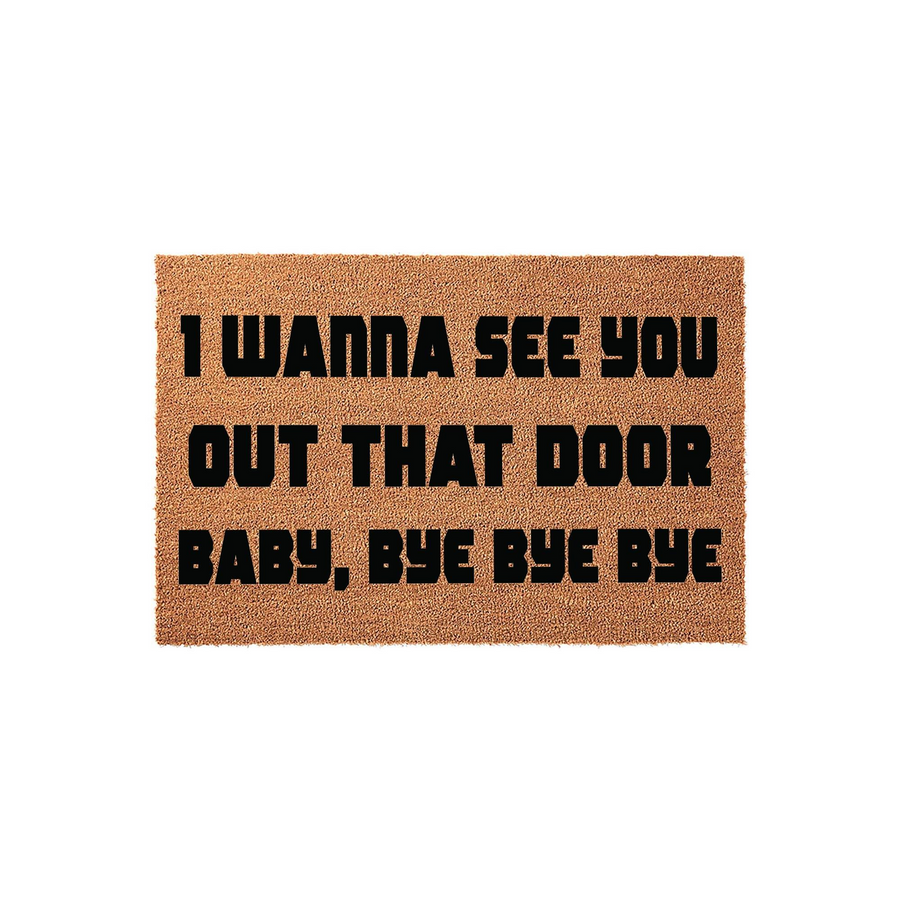 Funny Pop Culture Coir Doormat featuring the bold black text I Wanna See You Out That Door Baby, Bye Bye Bye printed on a natural brown coconut fiber mat, providing a humorous and welcoming entrance for any home or apartment
