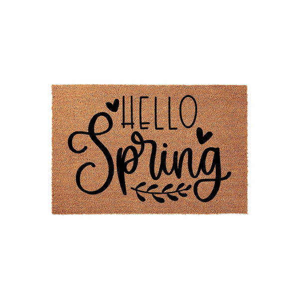 Hello Spring coir doormat featuring a natural tan fiber texture with black printed text and decorative heart and leaf accents, creating a welcoming seasonal entryway decor piece for your front porch or home entrance.