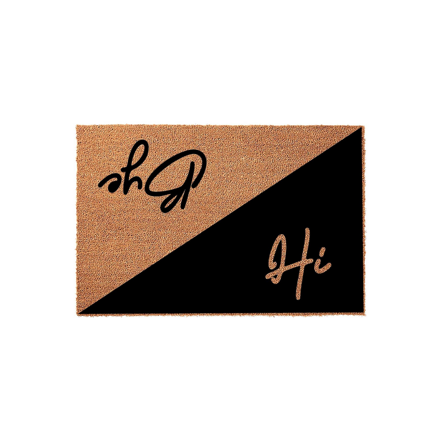 Hi Bye Coir Doormat featuring a modern diagonal split design with natural brown fiber on one side and a solid black section on the other, displaying playful cursive text that welcomes guests and bids them farewell at your front