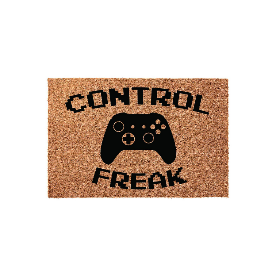 Control Freak Gamer Doormat featuring a black video game controller graphic and pixelated text on a natural tan coir background, making it a fun and unique entryway decor piece for any dedicated gaming room or home office