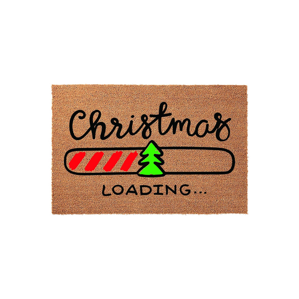 Christmas Loading coir doormat featuring a festive progress bar design with a small green pine tree icon, set against a natural tan fiber background to welcome guests to your home during the holiday season with a fun, modern
