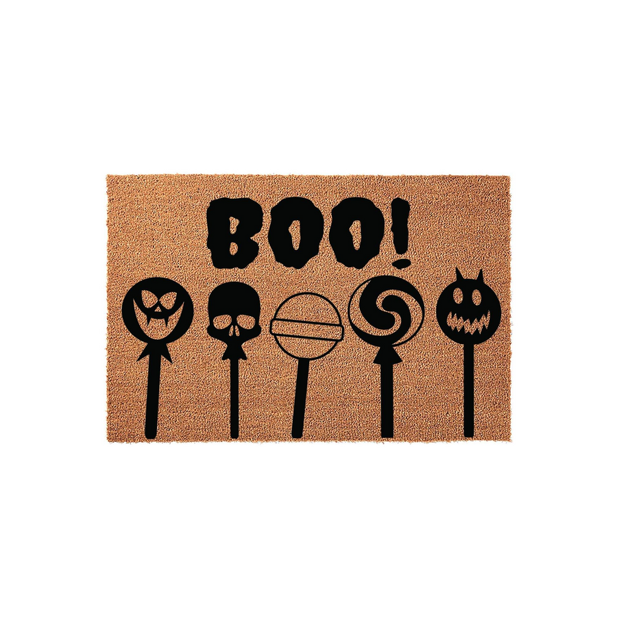 Halloween Boo! coir doormat featuring a row of five spooky lollipop-style icons, including a skull, a jack-o-lantern, and a vampire face, printed in bold black ink on a natural brown textured fiber surface for a festive entryway.