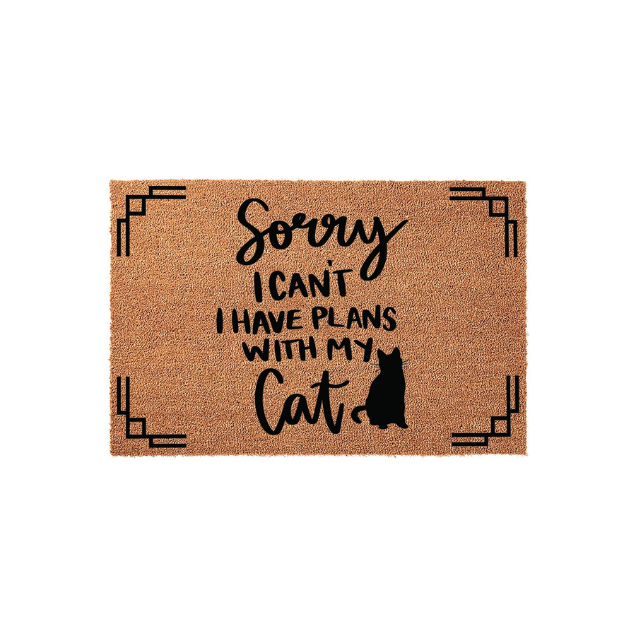 Sorry I Can't I Have Plans With My Cat coir doormat featuring a humorous quote in black lettering and a silhouette of a sitting cat, framed by simple geometric corner accents on a natural tan fiber background for a fun home