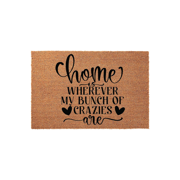 Home Is Wherever My Bunch Of Crazies Are coir doormat featuring natural brown fibers and bold black text with heart accents, providing a humorous and welcoming touch to any front porch entryway or home decor style for families.