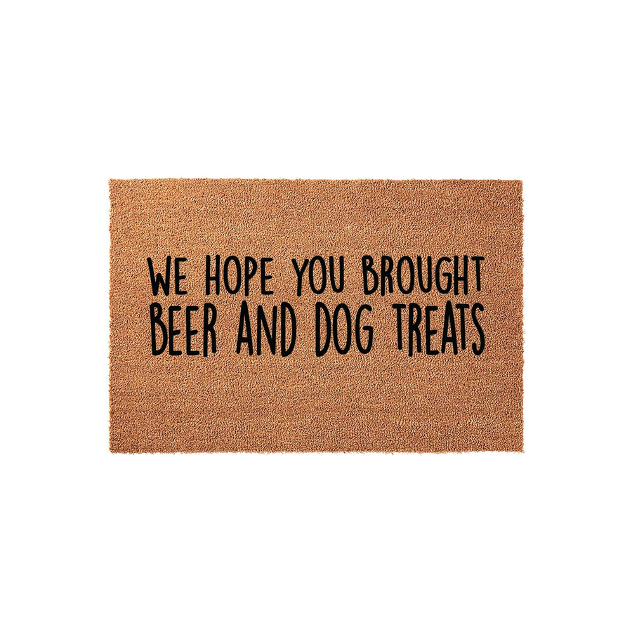 Funny Beer and Dog Treats Doormat featuring a natural coir texture with bold black text that reads We Hope You Brought Beer And Dog Treats, making it a humorous and welcoming addition to any front porch or entryway for pet lovers.