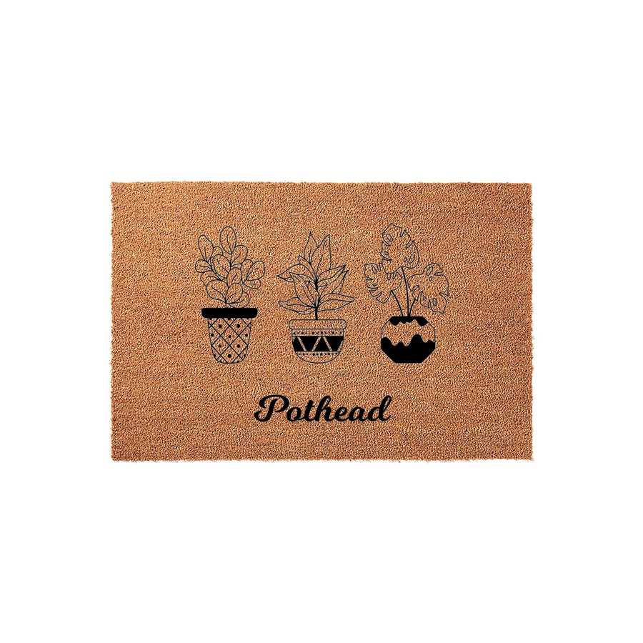 Pothead coir doormat featuring a humorous design of three potted houseplants in black line art, set against a natural brown textured background that adds a fun and welcoming touch to any front porch or entryway decor for plant