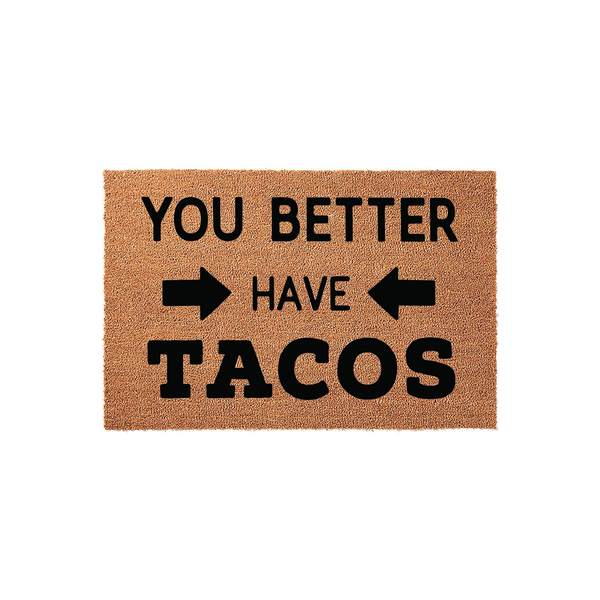 Funny You Better Have Tacos doormat made of natural coir fiber with a rectangular shape, featuring bold black text and directional arrows printed on the front to create a humorous welcome for guests at your front door or entryway.