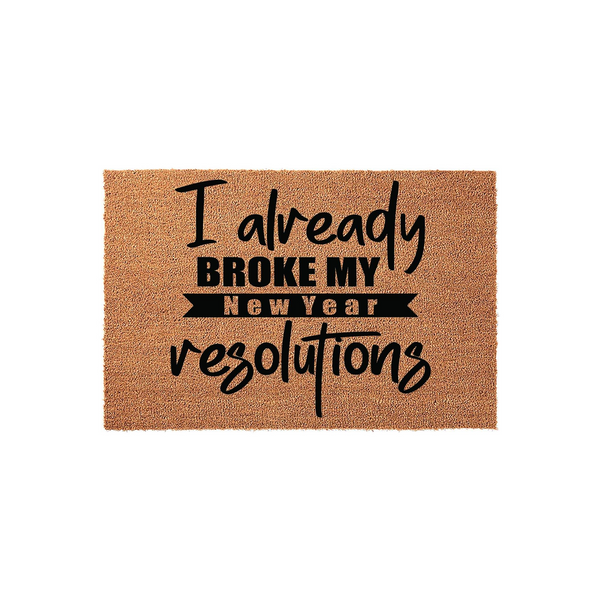 Funny New Year resolution coir doormat featuring a natural tan fiber texture and bold black typography that reads I already broke my New Year resolutions, making it a humorous front porch decor piece for the holiday season.