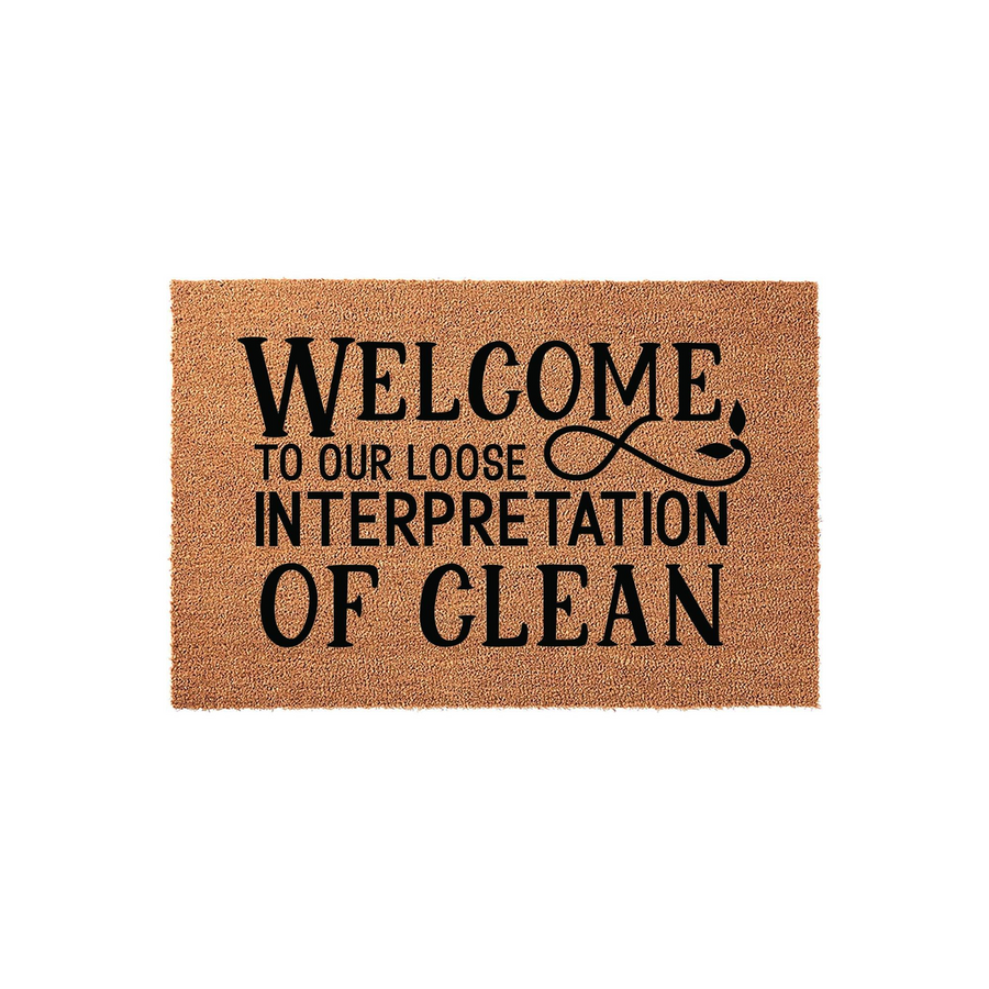 Funny Welcome Doormat featuring a natural coir texture with bold black text that reads Welcome, to our loose interpretation of clean, making it a humorous and welcoming addition to any front porch or entryway decor for your home.