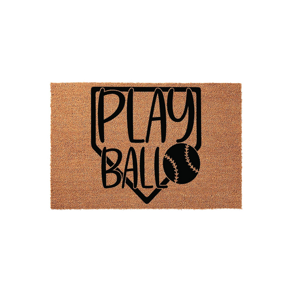 Baseball home plate doormat featuring a natural coir texture with a black printed design that says Play Ball inside a home plate shape, making it a fun outdoor entrance rug for any sports fan home or baseball themed front porch