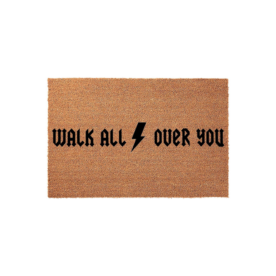 Funny Rock Music Themed Doormat featuring the text Walk All Over You in a bold, classic rock band font with a lightning bolt icon in the center, set against a natural tan coir fiber background for a unique front porch entryway