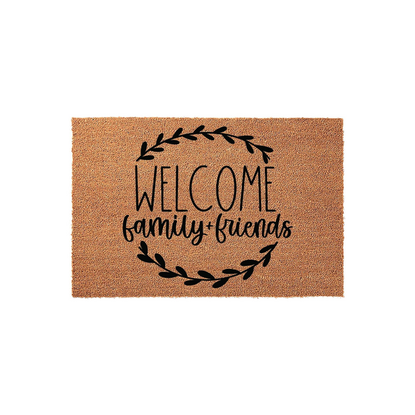 Welcome Family and Friends coir doormat featuring a natural brown fiber texture and black printed text centered inside a decorative leafy wreath design, creating a warm and inviting entryway accent for your home front porch decor.