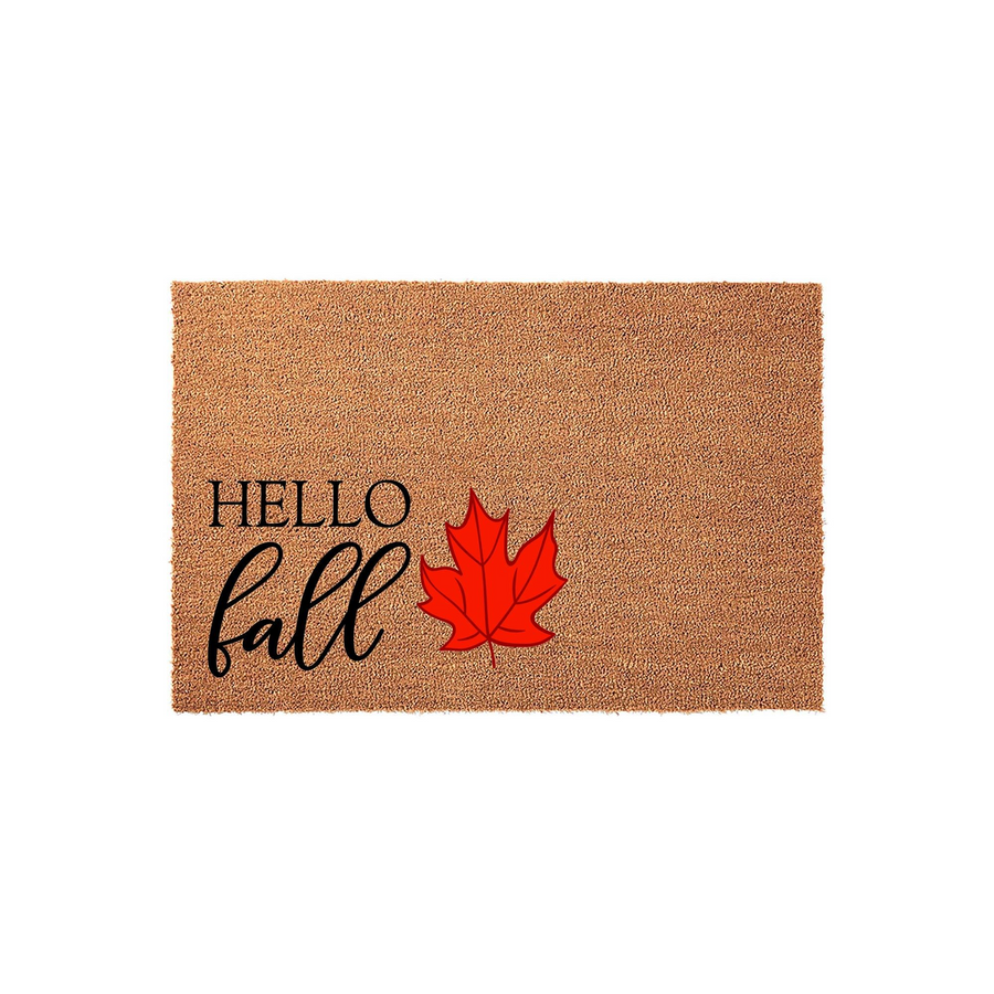 Hello Fall Coir Doormat featuring a natural brown fiber texture with black printed text and a vibrant red maple leaf illustration, creating a festive seasonal welcome for your front porch entryway during the autumn months.