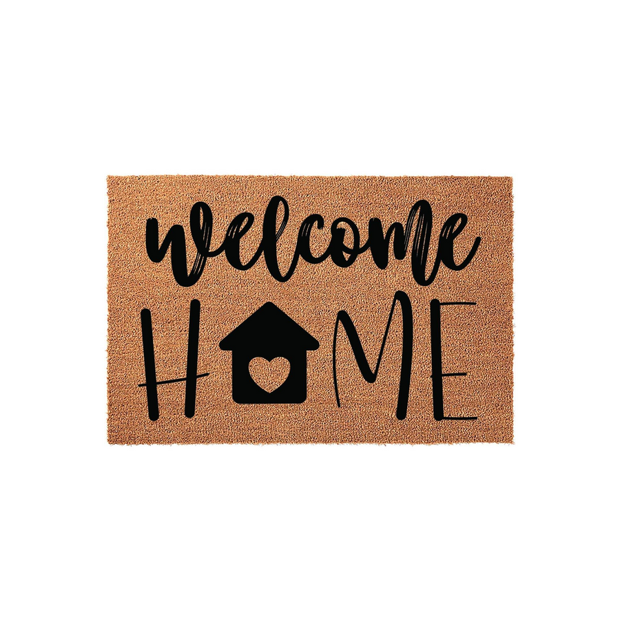 Welcome Home coir doormat featuring bold black typography and a house icon with a heart cutout in the center, displayed against a clean white background to highlight the natural tan texture of the durable outdoor floor mat