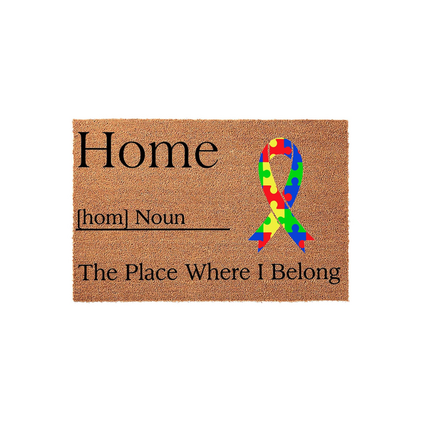 Autism Awareness Home Doormat featuring a natural coir texture with black text that defines home as the place where I belong, accented by a colorful puzzle piece ribbon graphic to show support for neurodiversity at your front