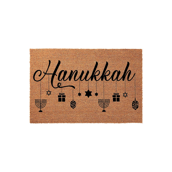 Hanukkah coir doormat featuring the word Hanukkah in elegant black script, accented by hanging icons of menorahs, dreidels, gift boxes, and Stars of David on a natural brown fiber background for a festive holiday entryway decor.