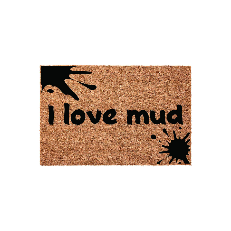 I Love Mud funny coir doormat featuring a natural brown fiber texture with bold black text and playful ink splatter designs in the corners, creating a humorous and welcoming entrance piece for any home front porch or entryway.