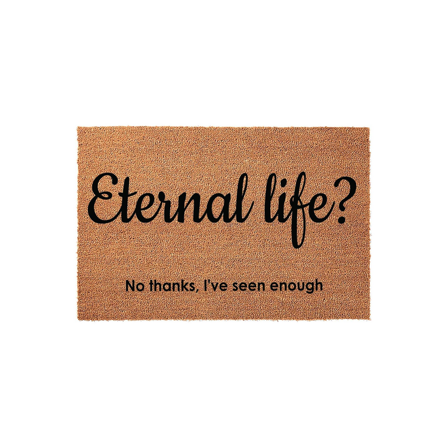 Funny Coir Doormat with the text Eternal life? No thanks, I've seen enough printed in black ink on a natural brown coconut fiber mat, providing a humorous and sarcastic welcome for guests at your front door entrance.