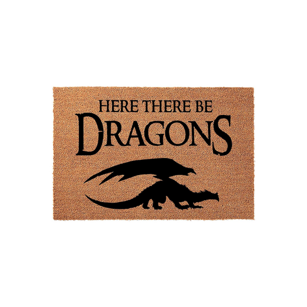Here There Be Dragons coir doormat featuring a bold black silhouette of a dragon and fantasy-themed text printed on a natural tan fiber background, making it a fun and unique entryway decor piece for any home or apartment front