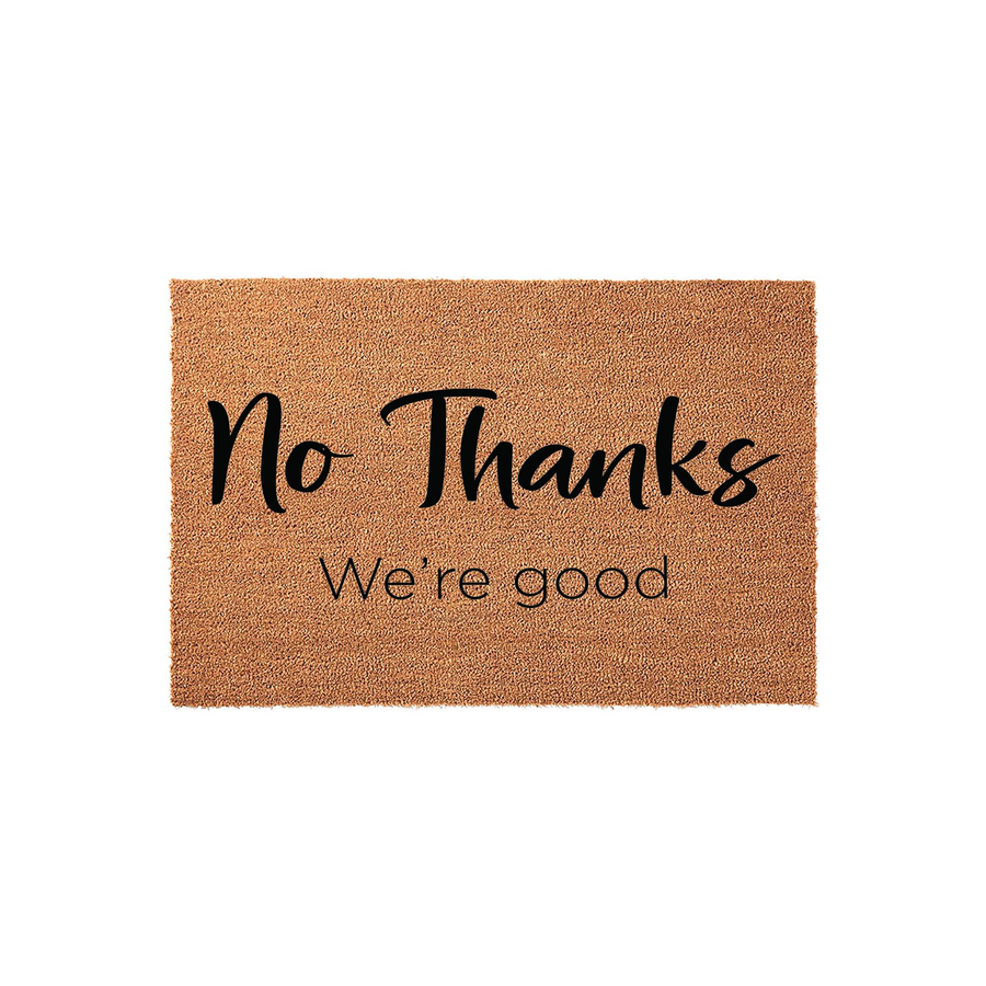 No Thanks We're Good funny doormat featuring a natural coir fiber texture and bold black typography, designed as a humorous front porch welcome mat for homeowners who prefer to keep solicitors and unexpected visitors away from