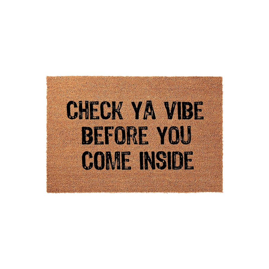Check Ya Vibe Before You Come Inside coir doormat featuring bold black text printed on a natural brown fiber background, creating a fun and welcoming entryway decor piece for your home front porch or apartment door entrance.