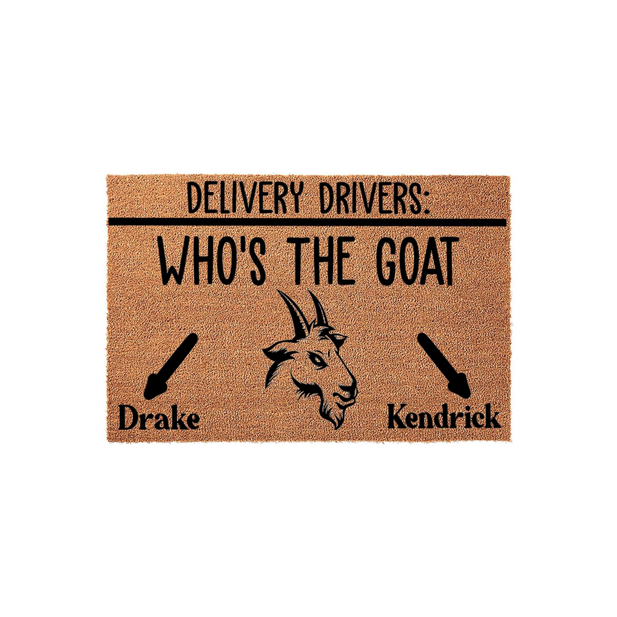 Funny Delivery Drivers Who Is The Goat Coir Doormat featuring a central goat illustration with arrows pointing toward the names Drake and Kendrick, printed on a natural brown textured coir fiber mat for a humorous front porch